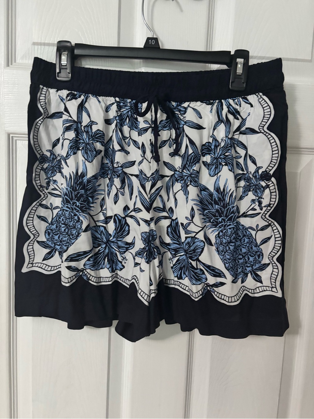 Free Assembly white & blue pineapple and floral print shorts